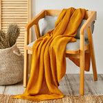 Karaca Home ocker Strickdecke Öko-Tex zertifiziert