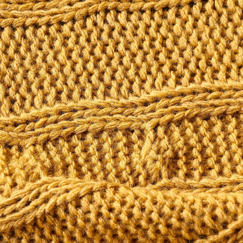 Karaca Home gestrickte Bommel Decke dunkelgelb